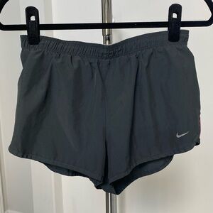 Nike dri fit size small dark grey and pink running shorts
